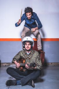 Drummer and guitarist playing, funny image
